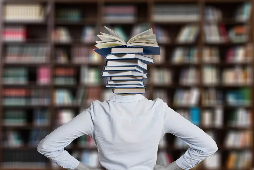 Indian students: Books, question mark and student