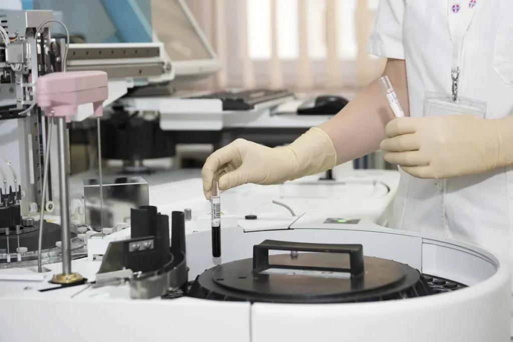 Phd in germany: Laboratory, test tubes and healthcare worker